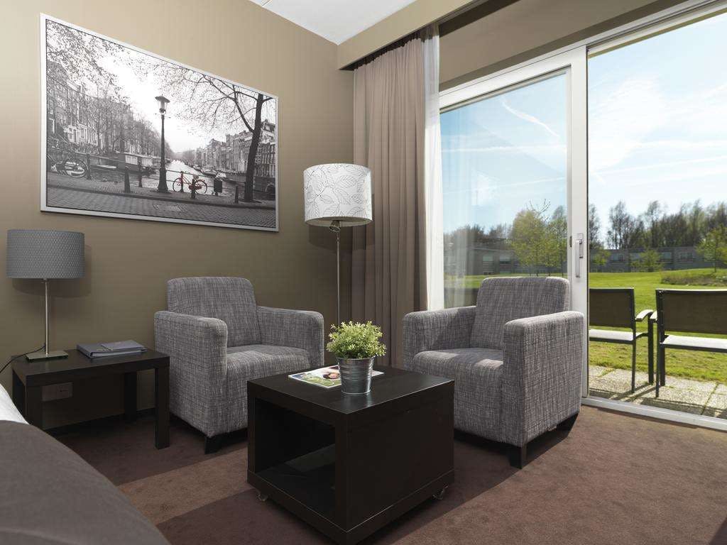 Hotel Hampshire Golfhotel – Waterland photo 1